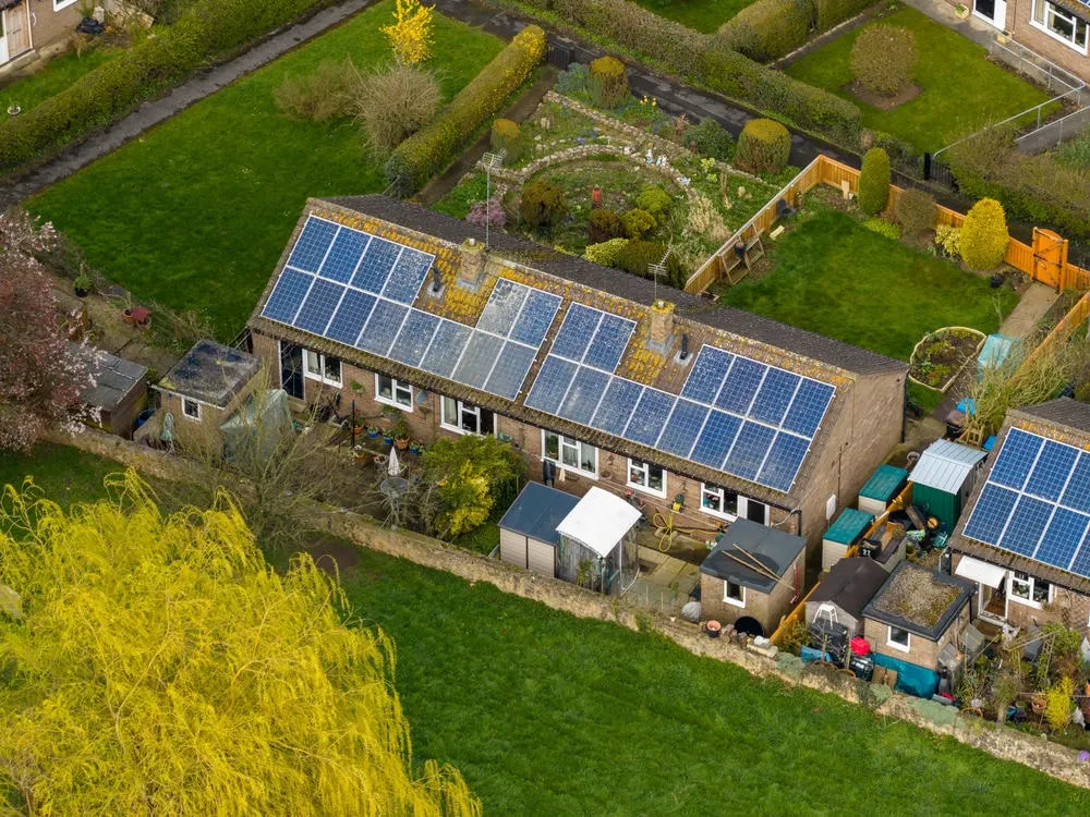 Aerial view of homes with rooftop solar